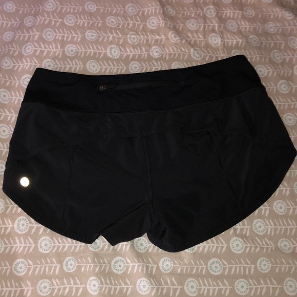 Two pairs of black Lulu Lemon shorts, size medium. - Picture 6 of 9